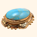 Turquoise Cabochon Brooch — actual supplier photograph on warm ivory